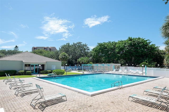 3150 W Rolling Hills Cir Unit 307, Davie, FL 33328 - community pool featuring a patio