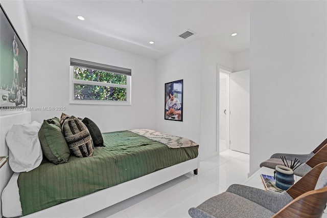 5055 N Bay Rd, Miami Beach, FL 33140 - tiled bedroom with recessed lighting