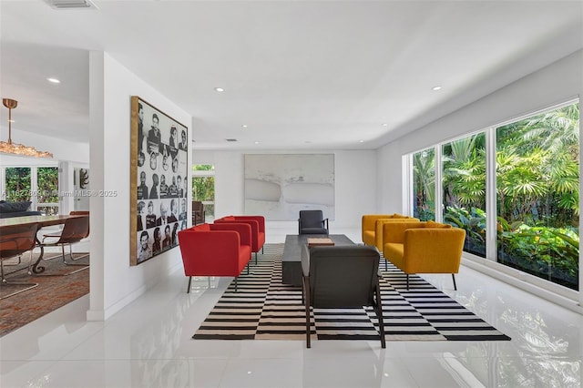 5055 N Bay Rd, Miami Beach, FL 33140 - tiled living area featuring healthy amount of natural light and recessed lighting