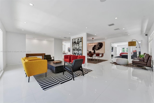 5055 N Bay Rd, Miami Beach, FL 33140 - tiled living room with recessed lighting and baseboards