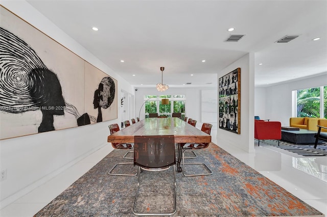 5055 N Bay Rd, Miami Beach, FL 33140 - dining area with recessed lighting and tile patterned floors