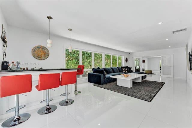 5055 N Bay Rd, Miami Beach, FL 33140 - tiled living area with recessed lighting
