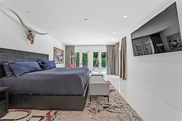 5055 N Bay Rd, Miami Beach, FL 33140 - bedroom with french doors, access to exterior, and recessed lighting
