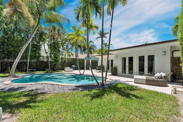 5055 N Bay Rd, Miami Beach, FL 33140 - view of swimming pool featuring french doors and a patio