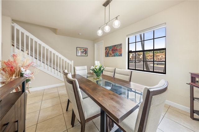 448 SE 32nd Ave, Homestead, FL 33033 - dining area featuring stairs and light tile patterned floors