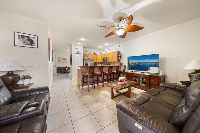 448 SE 32nd Ave, Homestead, FL 33033 - living room with light tile patterned floors and ceiling fan
