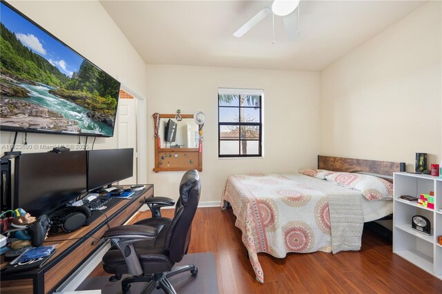 448 SE 32nd Ave, Homestead, FL 33033 - bedroom featuring a desk, wood finished floors, and a ceiling fan