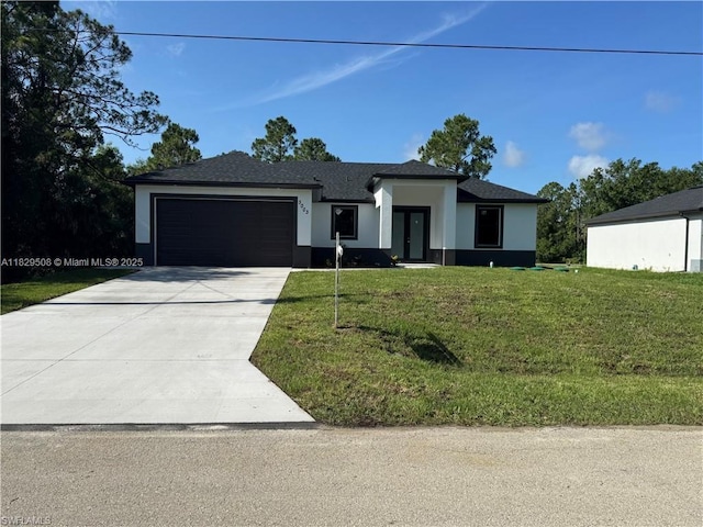 3003 18th St W, Lehigh Acres, FL 33976 - prairie-style home featuring stucco siding, an attached garage, french doors, driveway, and a front yard