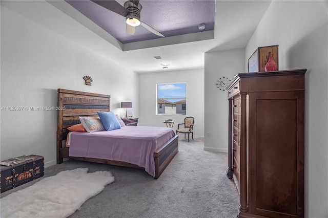 25483 SW 109th Ave, Homestead, FL 33032 - bedroom with light carpet, a raised ceiling, and ceiling fan