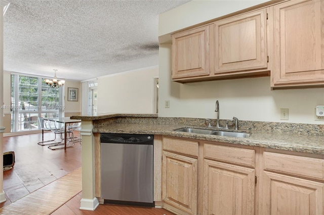 1280 S Alhambra Cir Unit 2206, Coral Gables, FL 33146 - kitchen with dishwasher, light brown cabinets, light wood finished floors, a chandelier, and a textured ceiling