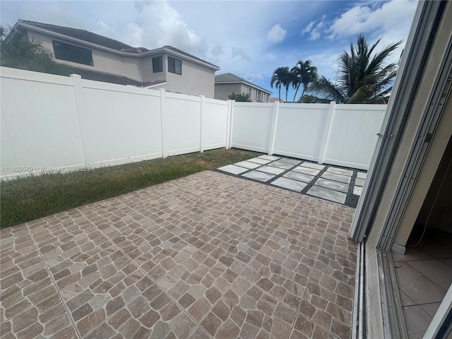 2383 SW 177th Ter, Miramar, FL 33029 - fenced backyard featuring a patio area