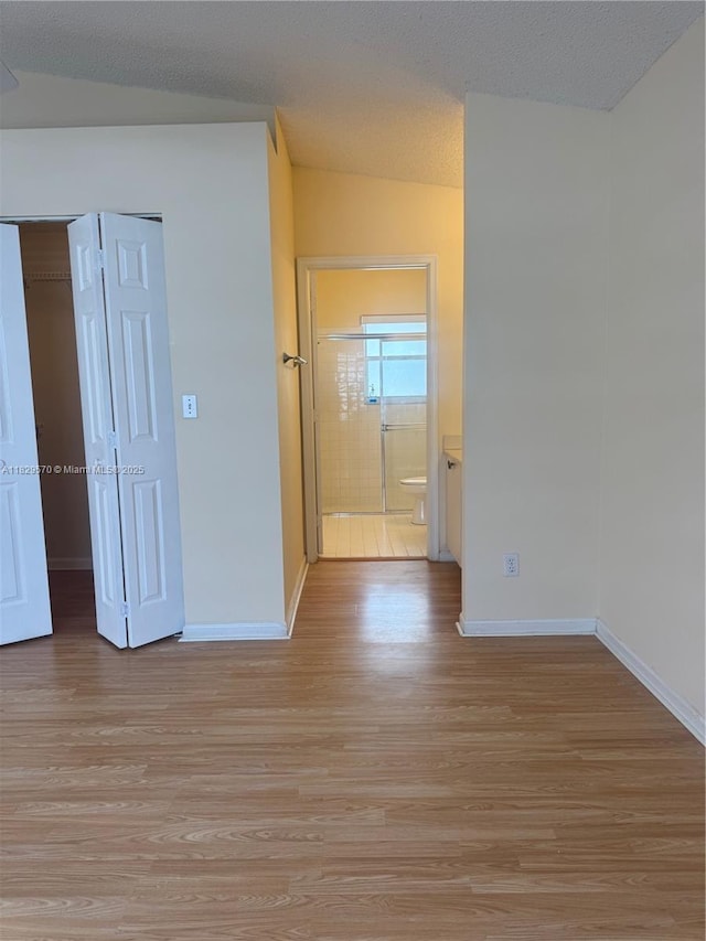2383 SW 177th Ter, Miramar, FL 33029 - spare room with light wood finished floors and vaulted ceiling