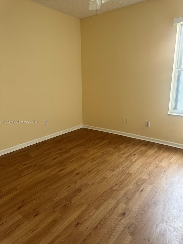 2383 SW 177th Ter, Miramar, FL 33029 - unfurnished room featuring wood finished floors and a ceiling fan