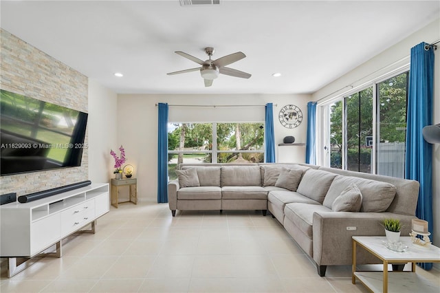 831 SW 178th Way, Pembroke Pines, FL 33029 - living area featuring healthy amount of natural light, a ceiling fan, light tile patterned floors, and recessed lighting