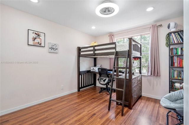831 SW 178th Way, Pembroke Pines, FL 33029 - bedroom with wood finished floors, an office area, and recessed lighting