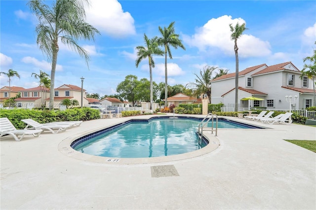 831 SW 178th Way, Pembroke Pines, FL 33029 - community pool with a residential view and a patio