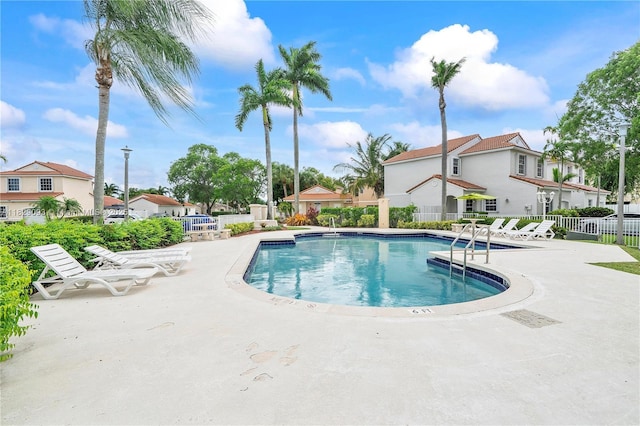 831 SW 178th Way, Pembroke Pines, FL 33029 - community pool with a residential view and a patio area