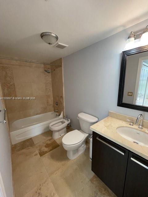 2650 SW 37th Ave Unit 501, Miami, FL 33133 - full bath with vanity, shower / bath combination, and a bidet