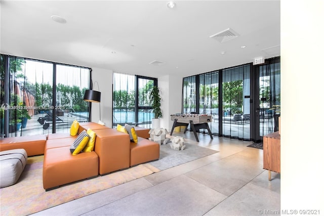 121 NE 34th St Unit 1009, Miami, FL 33137 - building lobby featuring floor to ceiling windows