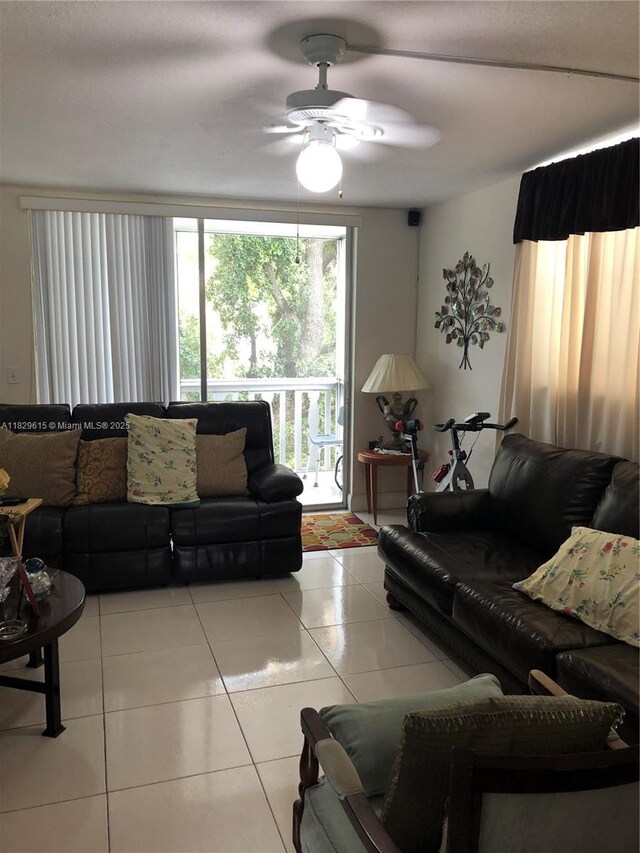 1475 NE 125th Ter Unit 301A, North Miami, FL 33161 - tiled living room featuring a ceiling fan