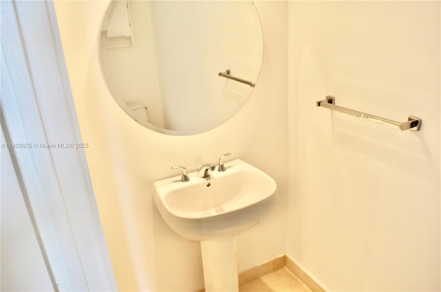 1060 Brickell Ave Unit 3705, Miami, FL 33131 - bathroom with baseboards and a sink
