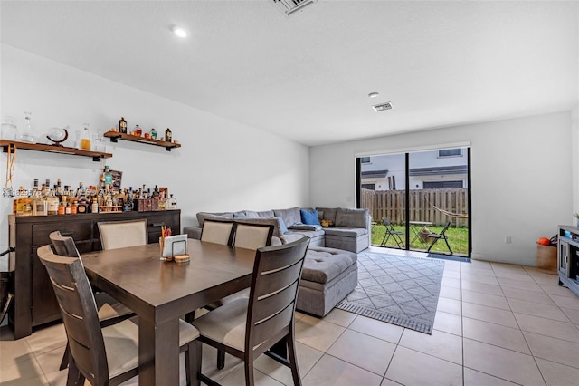 10962 SW 235, Homestead, FL 33032 - dining room featuring light tile patterned floors