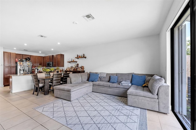 10962 SW 235, Homestead, FL 33032 - living room with light tile patterned flooring, healthy amount of natural light, and recessed lighting