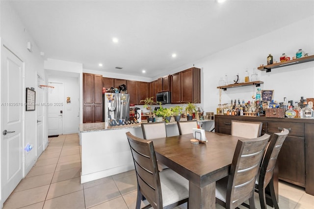 10962 SW 235, Homestead, FL 33032 - dining space featuring light tile patterned floors and recessed lighting