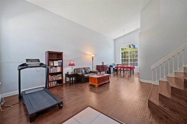 960 NW 185th Ave, Pembroke Pines, FL 33029 - living room featuring stairway, wood finished floors, and high vaulted ceiling