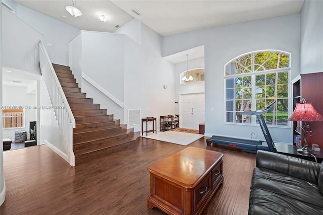 960 NW 185th Ave, Pembroke Pines, FL 33029 - living room featuring high vaulted ceiling, stairway, and dark wood-style flooring