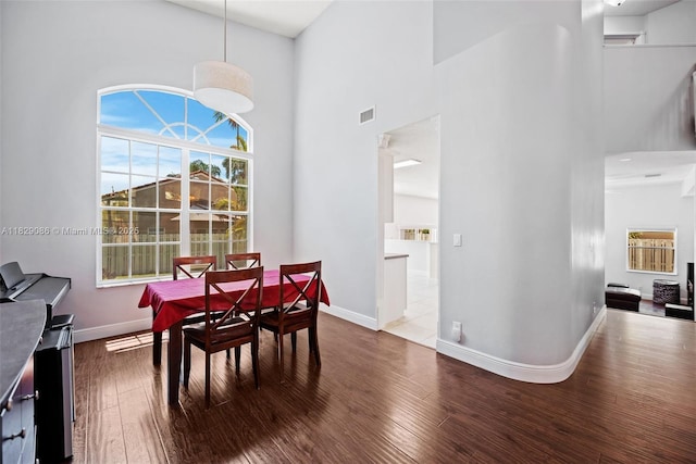 960 NW 185th Ave, Pembroke Pines, FL 33029 - dining area featuring wood finished floors and a high ceiling