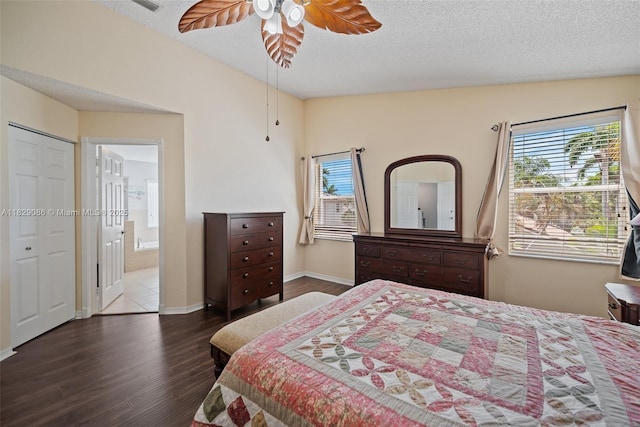 960 NW 185th Ave, Pembroke Pines, FL 33029 - bedroom with wood finished floors, a textured ceiling, ensuite bathroom, and a ceiling fan