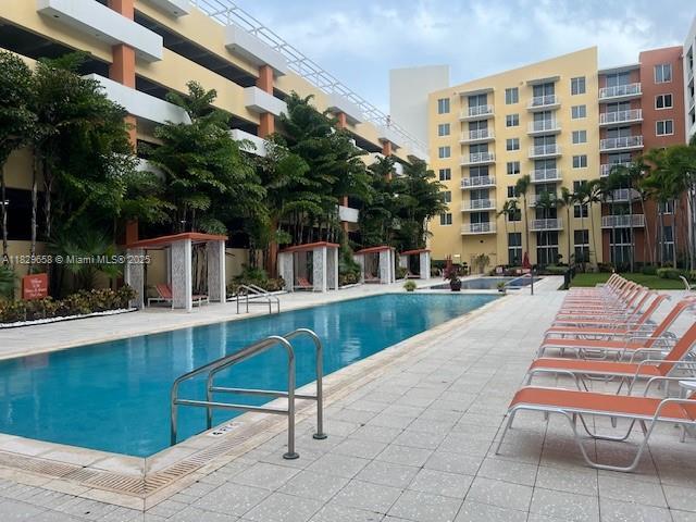 2775 NE 187th St Unit 202, Aventura, FL 33180 - community pool with a patio area