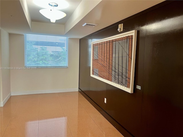 2775 NE 187th St Unit 202, Aventura, FL 33180 - empty room featuring baseboards and a pendent fire sprinkler