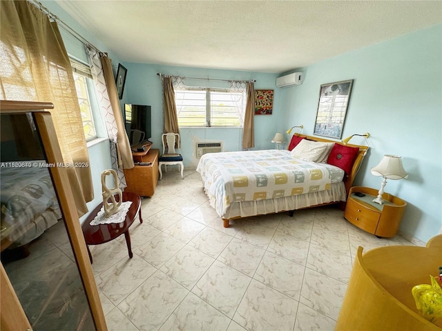17001 NE 13th Ave Unit 202, Miami, FL 33162 - bedroom featuring an AC wall unit, marble look tiles, and a textured ceiling