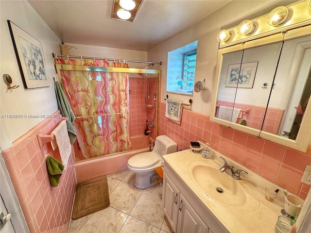 17001 NE 13th Ave Unit 202, Miami, FL 33162 - bathroom with shower / tub combo, vanity, tile walls, tile patterned floors, and a wainscoted wall