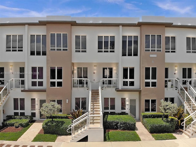 10255 NW 63rd Ter Unit 204, Doral, FL 33178 - view of building exterior with stairway