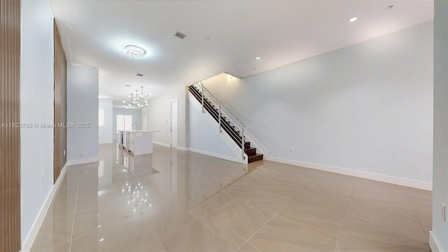 10255 NW 63rd Ter Unit 204, Doral, FL 33178 - empty room with a chandelier, stairs, light tile patterned floors, and recessed lighting