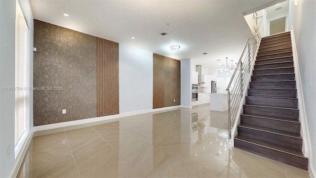 10255 NW 63rd Ter Unit 204, Doral, FL 33178 - staircase featuring tile patterned floors and recessed lighting