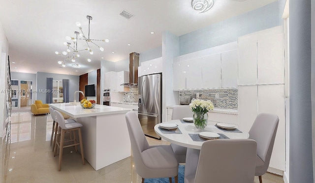 10255 NW 63rd Ter Unit 204, Doral, FL 33178 - dining area with a chandelier and light tile patterned floors