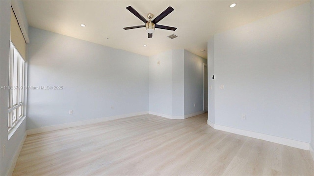 10255 NW 63rd Ter Unit 204, Doral, FL 33178 - empty room with light wood-type flooring, ceiling fan, and recessed lighting