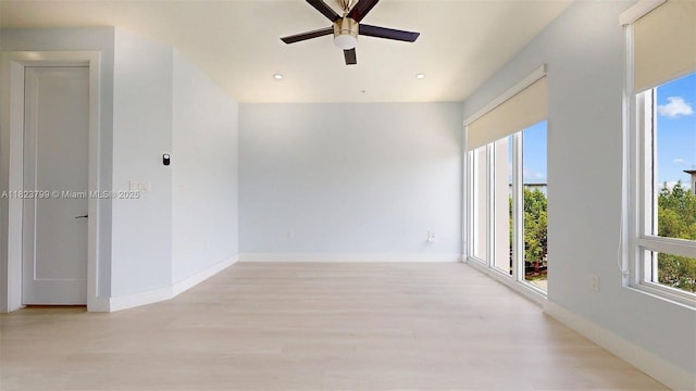10255 NW 63rd Ter Unit 204, Doral, FL 33178 - unfurnished room featuring light wood-type flooring, ceiling fan, and recessed lighting