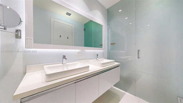 10255 NW 63rd Ter Unit 204, Doral, FL 33178 - bathroom featuring a stall shower and double vanity