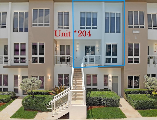 10255 NW 63rd Ter Unit 204, Doral, FL 33178 - view of property featuring stairs