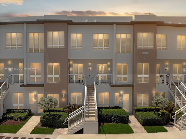 10255 NW 63rd Ter Unit 204, Doral, FL 33178 - view of front of house with stairway and stucco siding