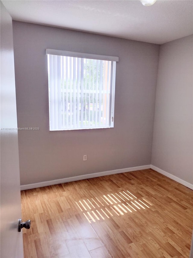 654 SW 106th Ave Unit 1502, Pembroke Pines, FL 33025 - spare room with light wood-style flooring