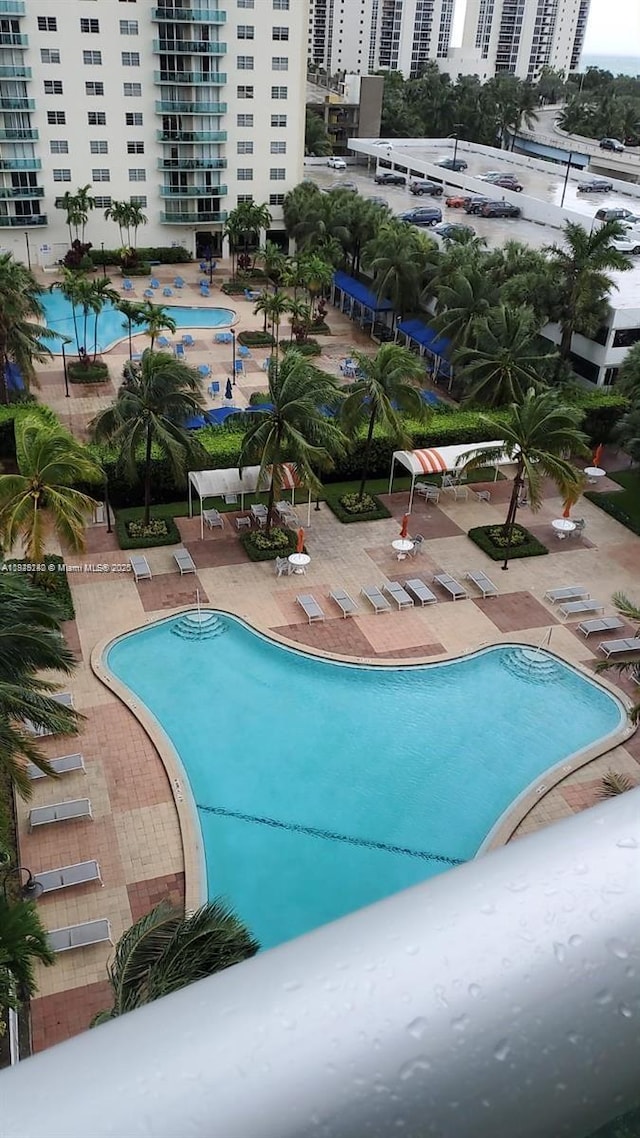 19380 Collins Ave Unit 808, Sunny Isles Beach, FL 33160 - community pool featuring a patio