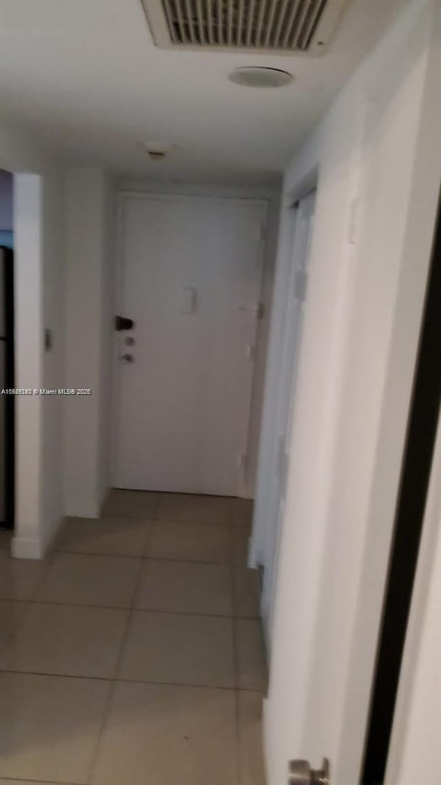 19380 Collins Ave Unit 808, Sunny Isles Beach, FL 33160 - hallway featuring light tile patterned floors