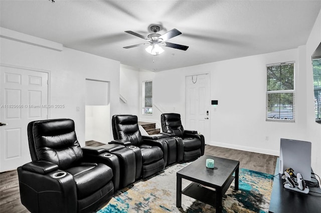11898 SW 25th Ct Unit 103, Miramar, FL 33025 - cinema room featuring wood finished floors, ceiling fan, healthy amount of natural light, and a textured ceiling