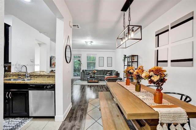 11898 SW 25th Ct Unit 103, Miramar, FL 33025 - dining room featuring baseboards and light wood-style floors